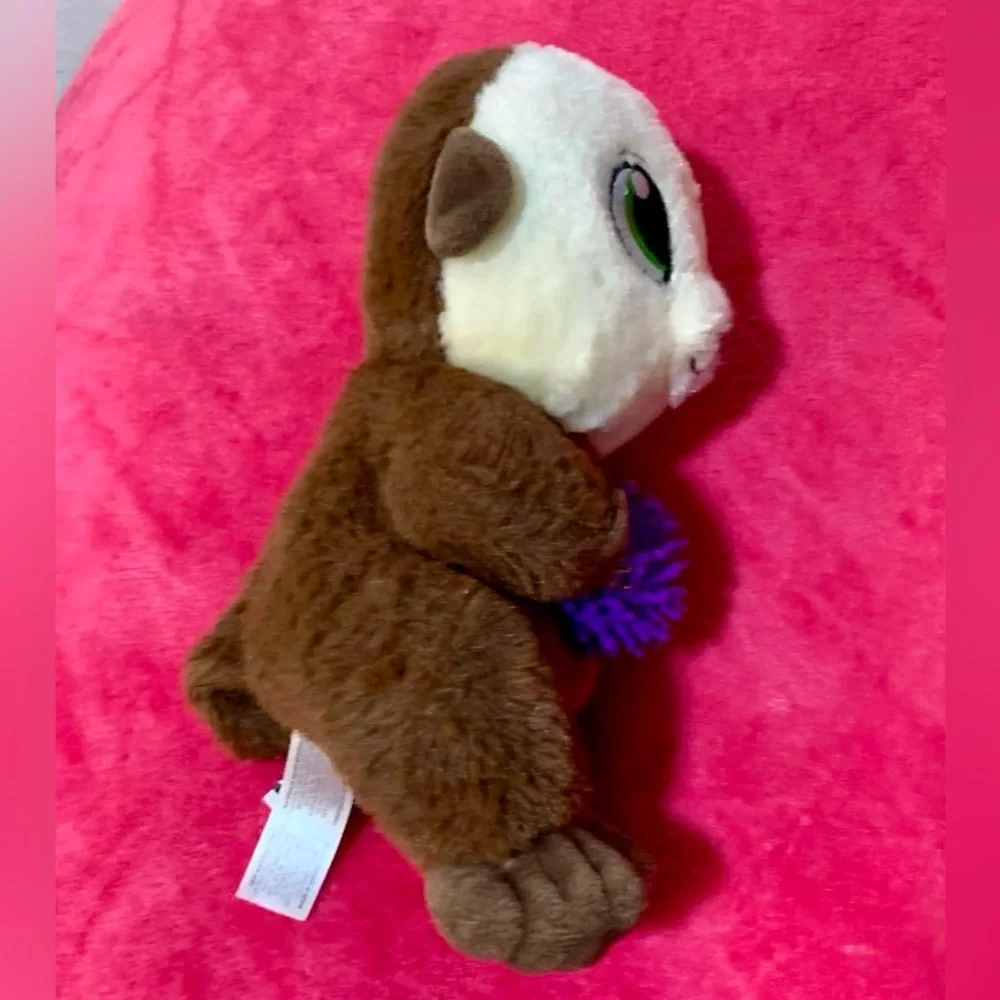 Plush Otter Toy with Purple Ball